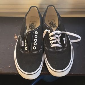 Black Vans canvas sneakers